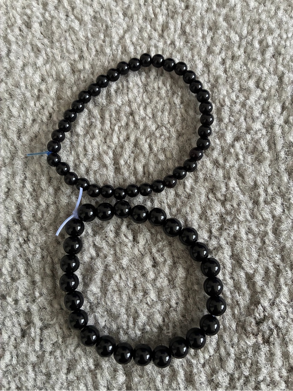 Two black bracelets